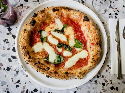 Físico ucraniano viajó a Roma para descubrir la fórmula científica de la pizza perfecta